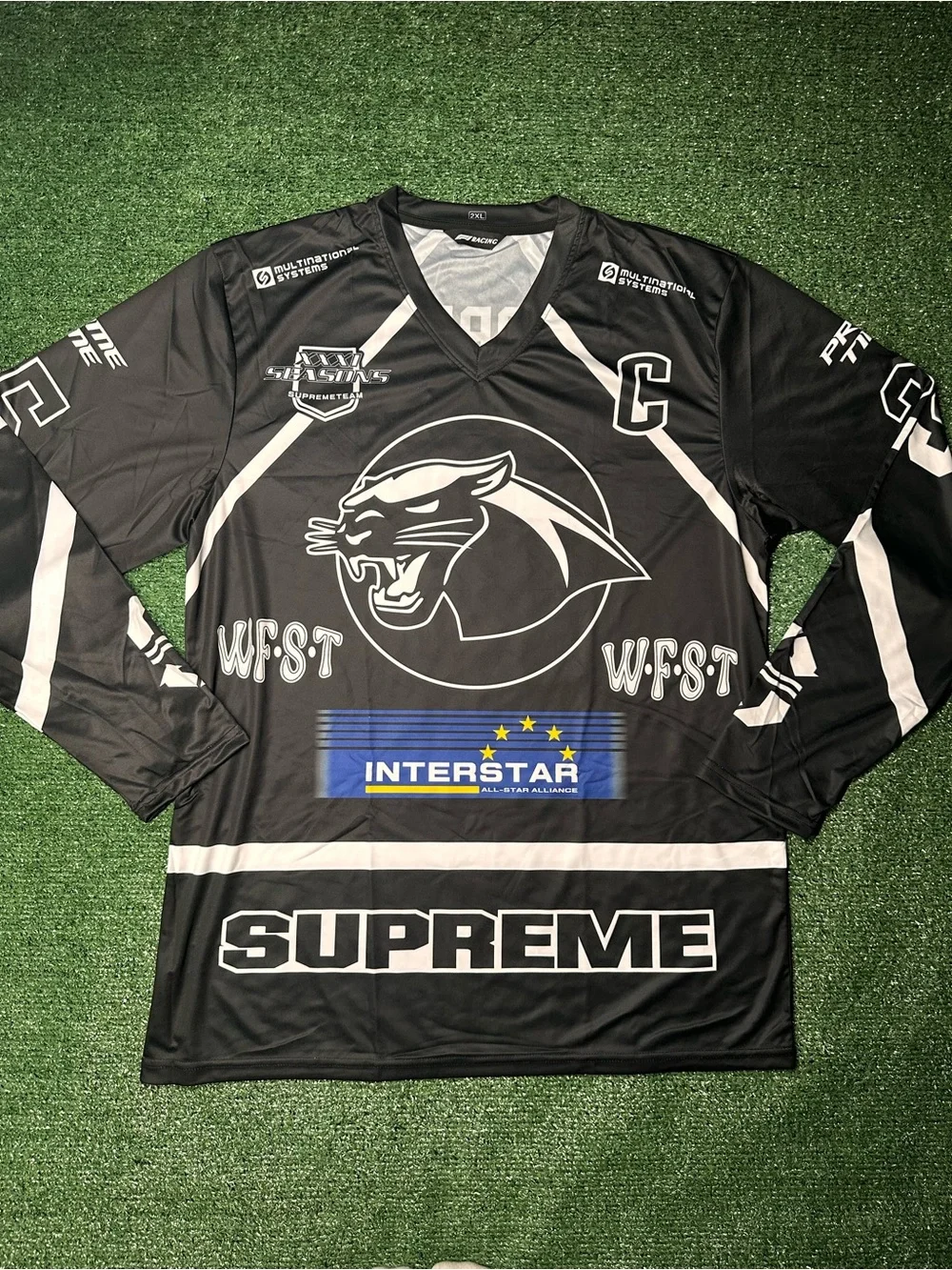 “SUPREME” Logo Black & White Panther Hockey Jersey.